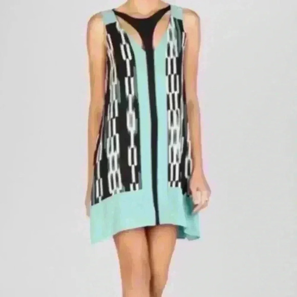 BCBG MaxAzria  | Amelia dress with cut outs black and teal size small - Picture 1 of 6
